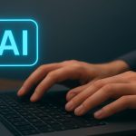 Hands typing on a laptop with a glowing AI icon, illustrating artificial intelligence and compliance in technology.